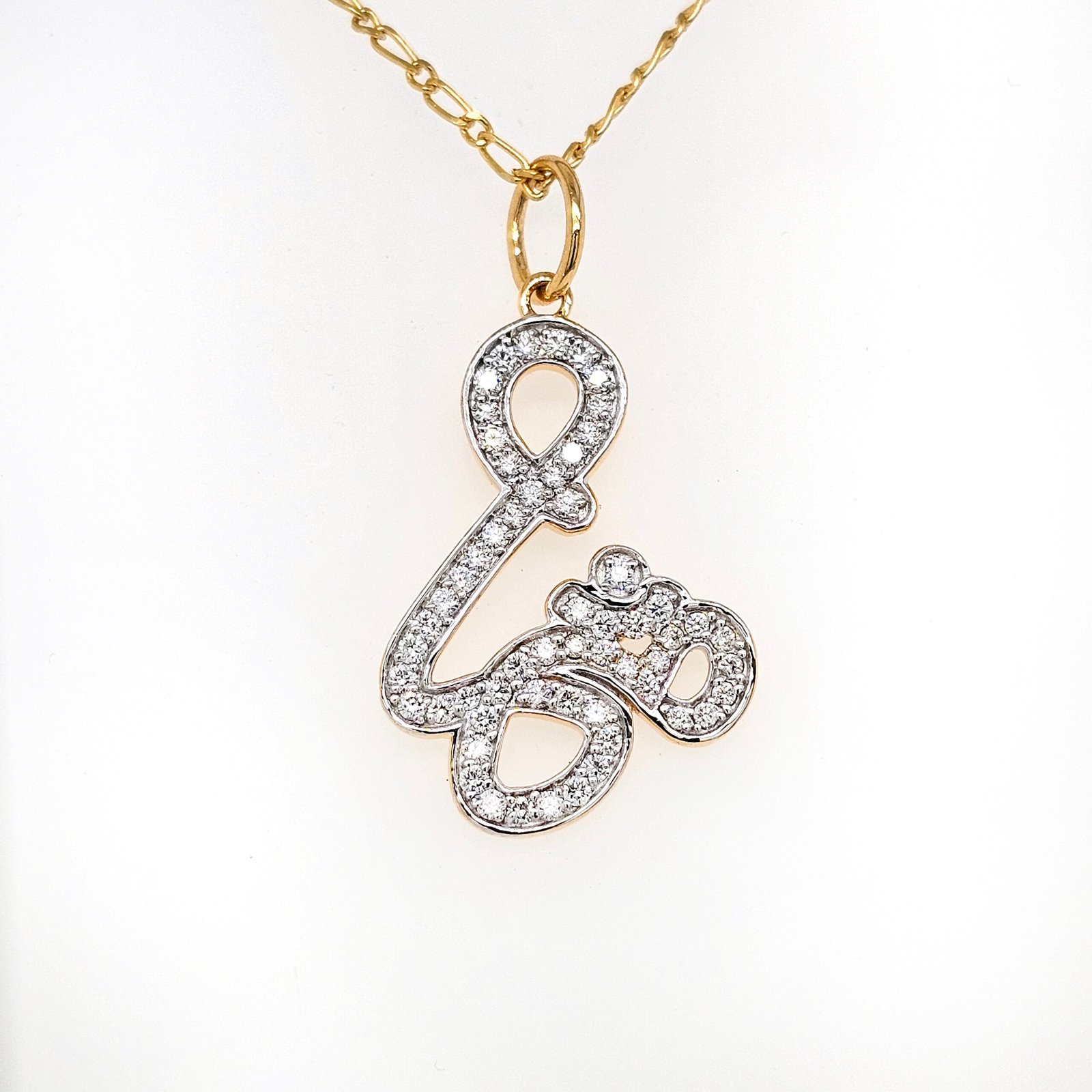 Exquisite Chinmay Om Pendant in 14K Yellow Gold with Diamonds
